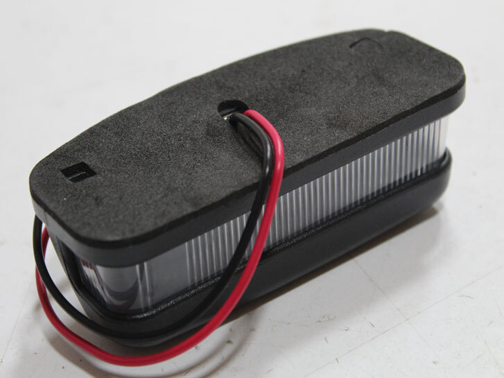 Підсвічування номерного знаку 49mm*111 mm *40 mm 6 LED WHITE 12-24V IP67